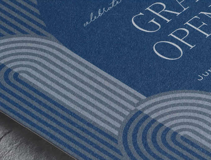 Closeup image of a custom invitation with modern arch design in navy and gray digital print