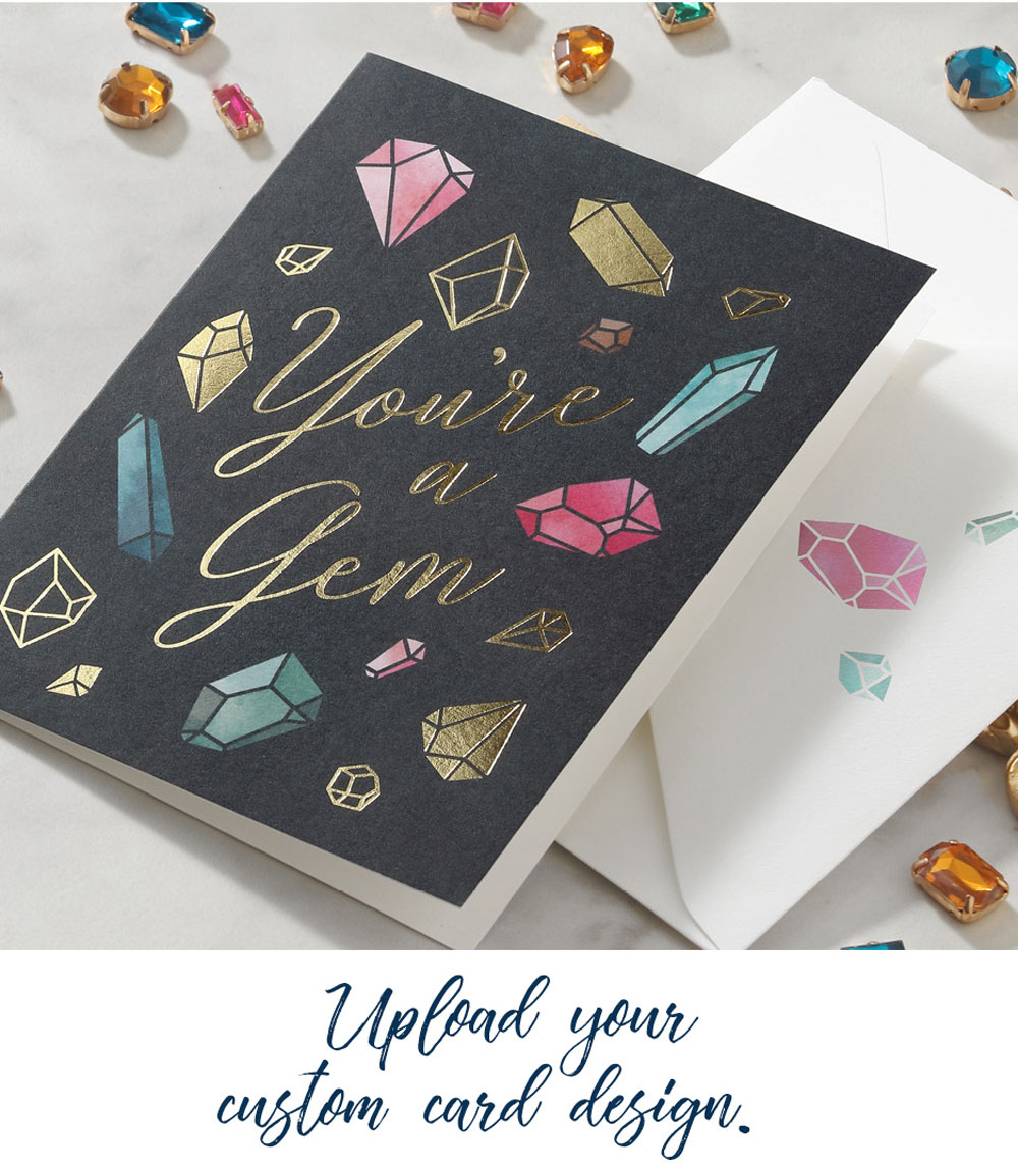 A custom printed greeting card with gold foil and colorful gem design is shown with antique frames