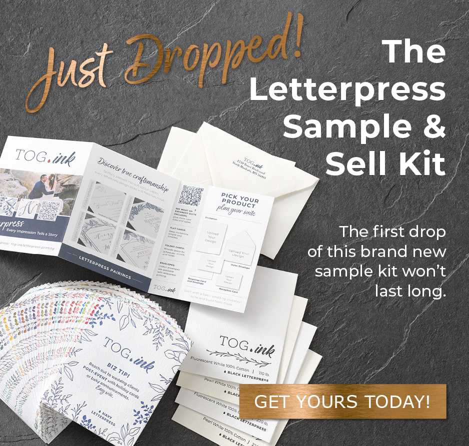 Various parts of the letterpress sample and sell kit are laid out against a slate background.