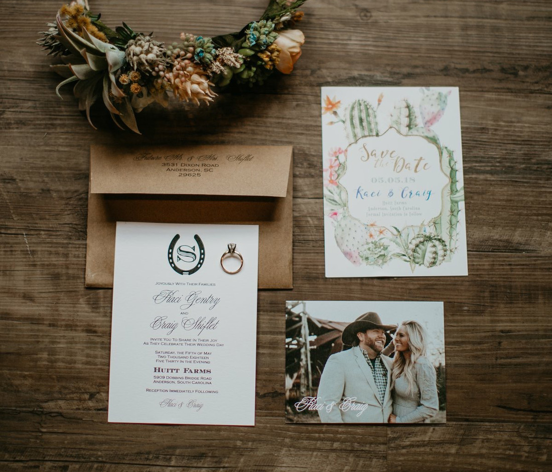 An elegant arrangement of three different save the date cards. 