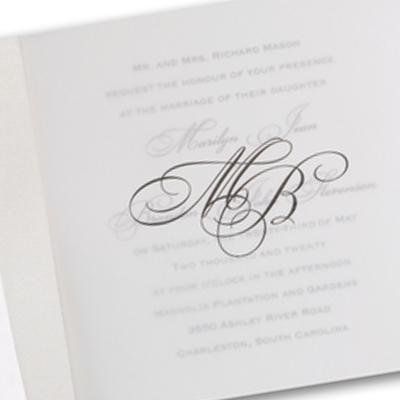 Wedding invitation with transparent vellum overlay. 