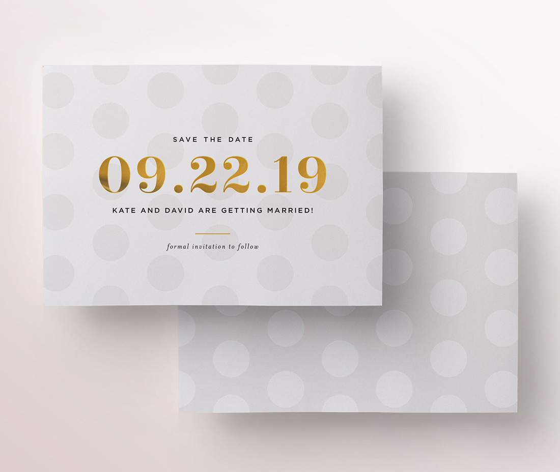 A polka dot save the date with gold foil stamping. 