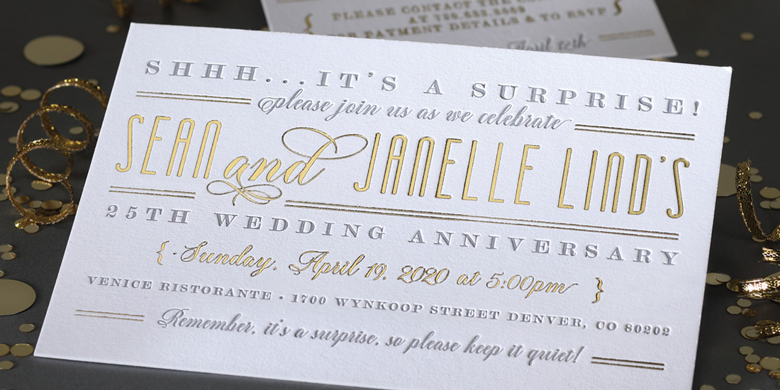 A custom designed surprise birthday invitation featuring gray letterpress printing with gold foil accents. 
