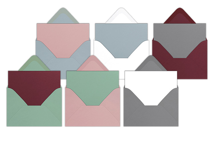 Muted color combinations shown with flat cards and envelopes including gray and pink, sage and merlot and gray and white. 