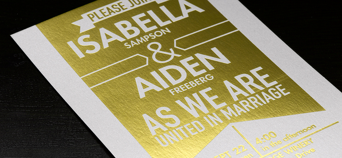 Wedding invitation with gold foil stamping. 