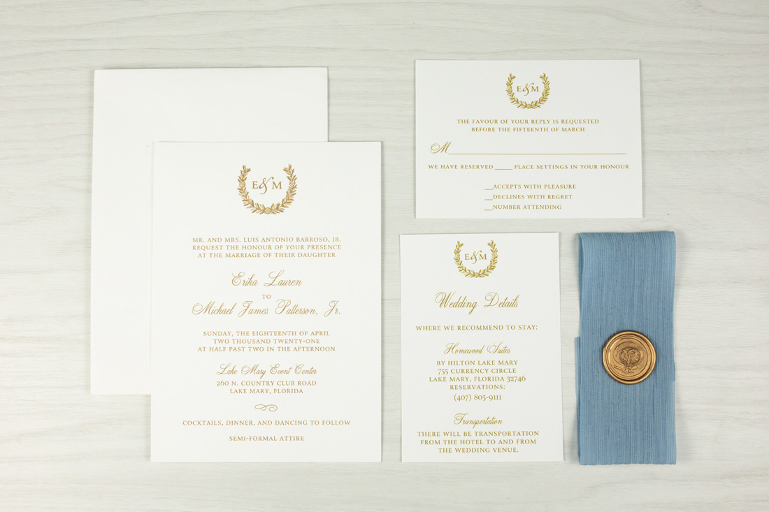 Classic wedding invitation suite with crest in thermography and shown with a traditional wax seal. 