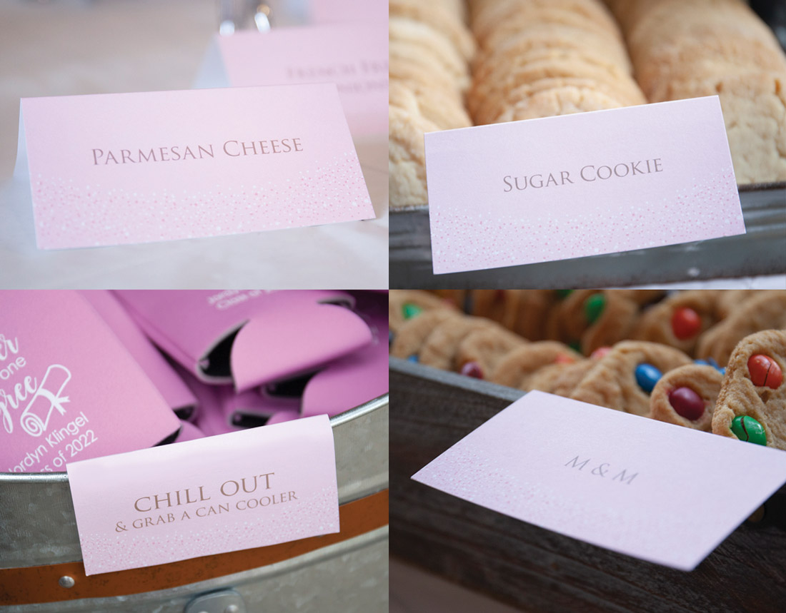 Variable printed place cards used as food labels at a graduation party.